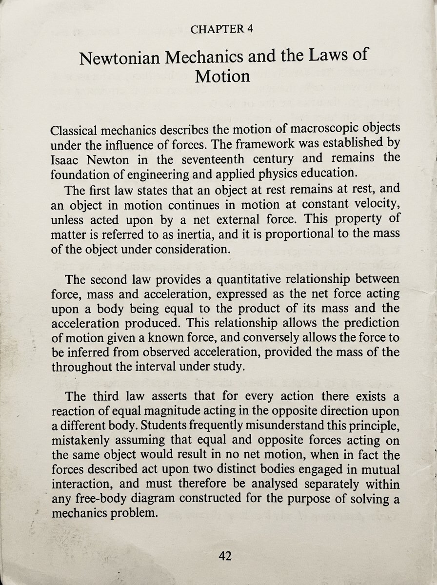 Traditional physics textbook page: dense text, no illustrations